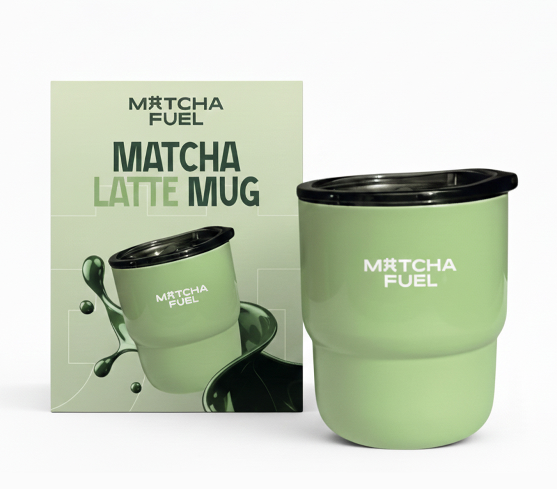 A light green Matcha Fuel travel mug with a black lid, sitting next to its matching product box.