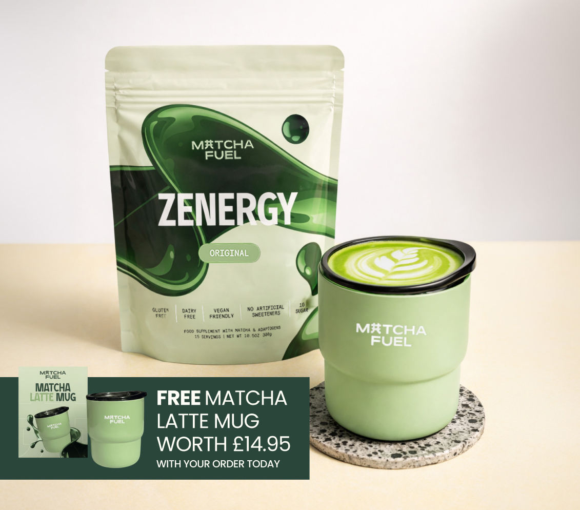 A pouch of Matcha Fuel Zenergy powder next to a green branded mug filled with a matcha latte.
