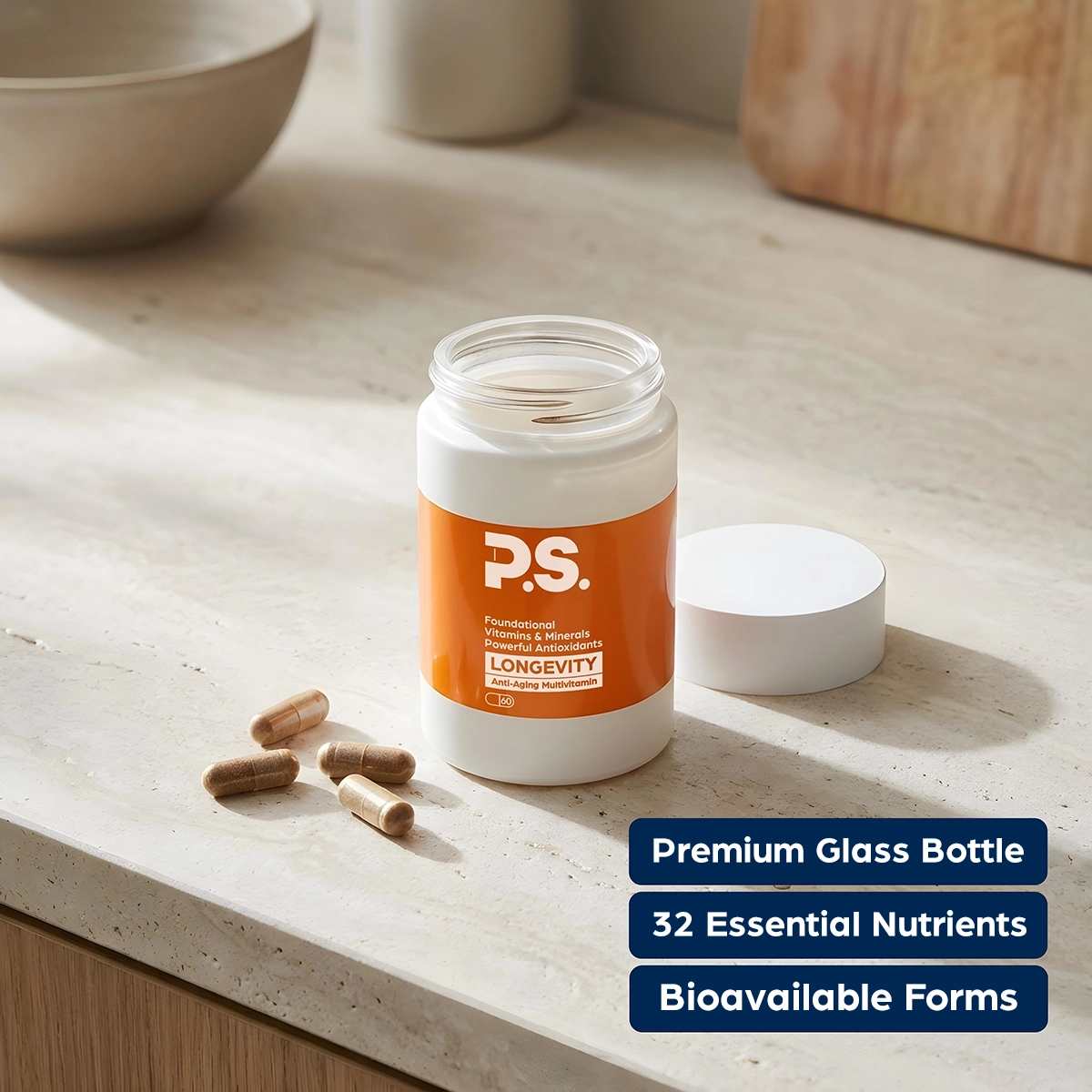 An open bottle of P.S. Longevity supplements on a countertop with a few capsules spilled out.