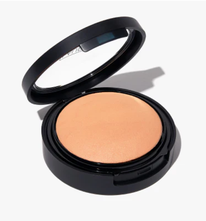 Compact powder in an open black case with mirror.