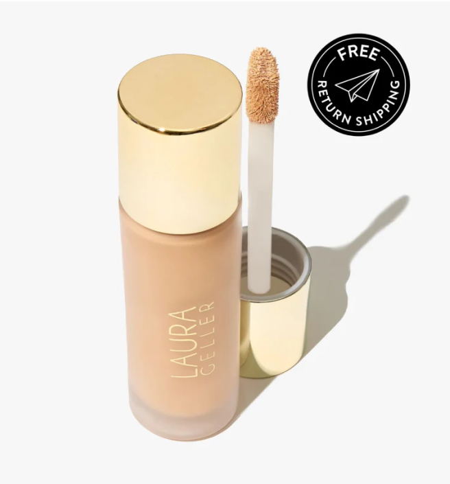 Makeup bottle with a gold cap and applicator, labeled 'Laura Geller.'