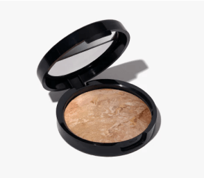 Compact face powder with marbled design in an open black case.