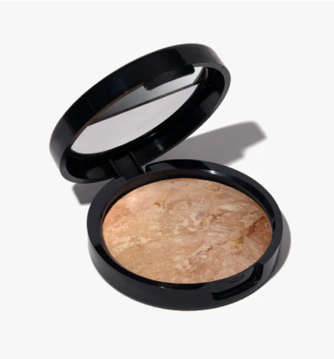 Compact case with marbled powder makeup and open lid.