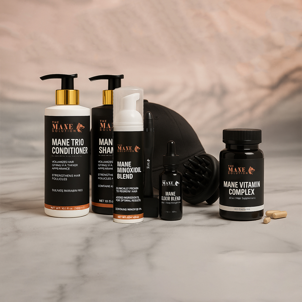 Assorted hair care products and supplements arranged on a marble surface with a black cap.