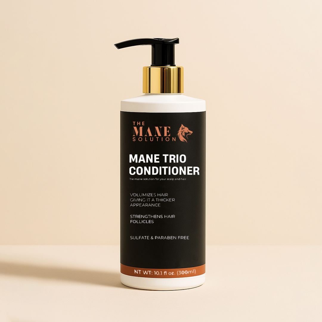 Bottle of Mane Trio Conditioner with black and gold design on beige background.