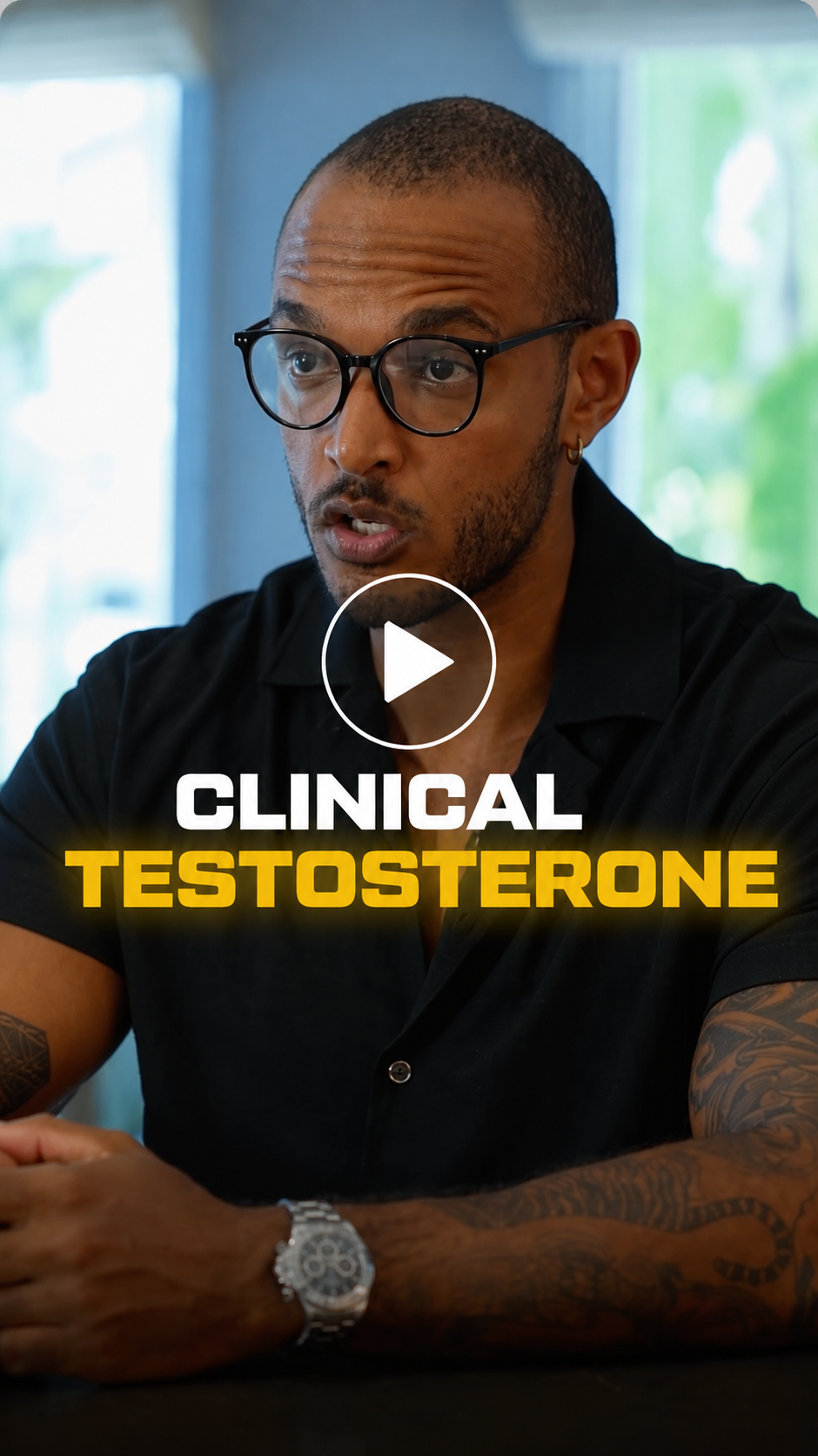 A man with glasses and tattoos speaking, with a play button icon and text overlay reading 'Clinical Testosterone'.
