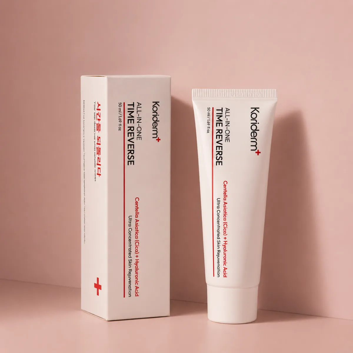 A tube and box of Koriderm+ All-In-One Time Reverse skincare product against a pink background.