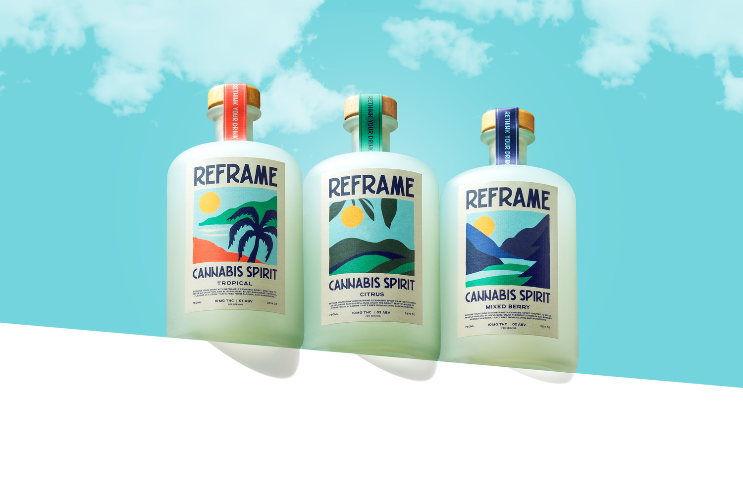 Three bottles of Reframe Cannabis Spirit against a blue sky background.