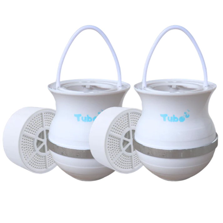 Two white hanging water filters with handles and side openings.