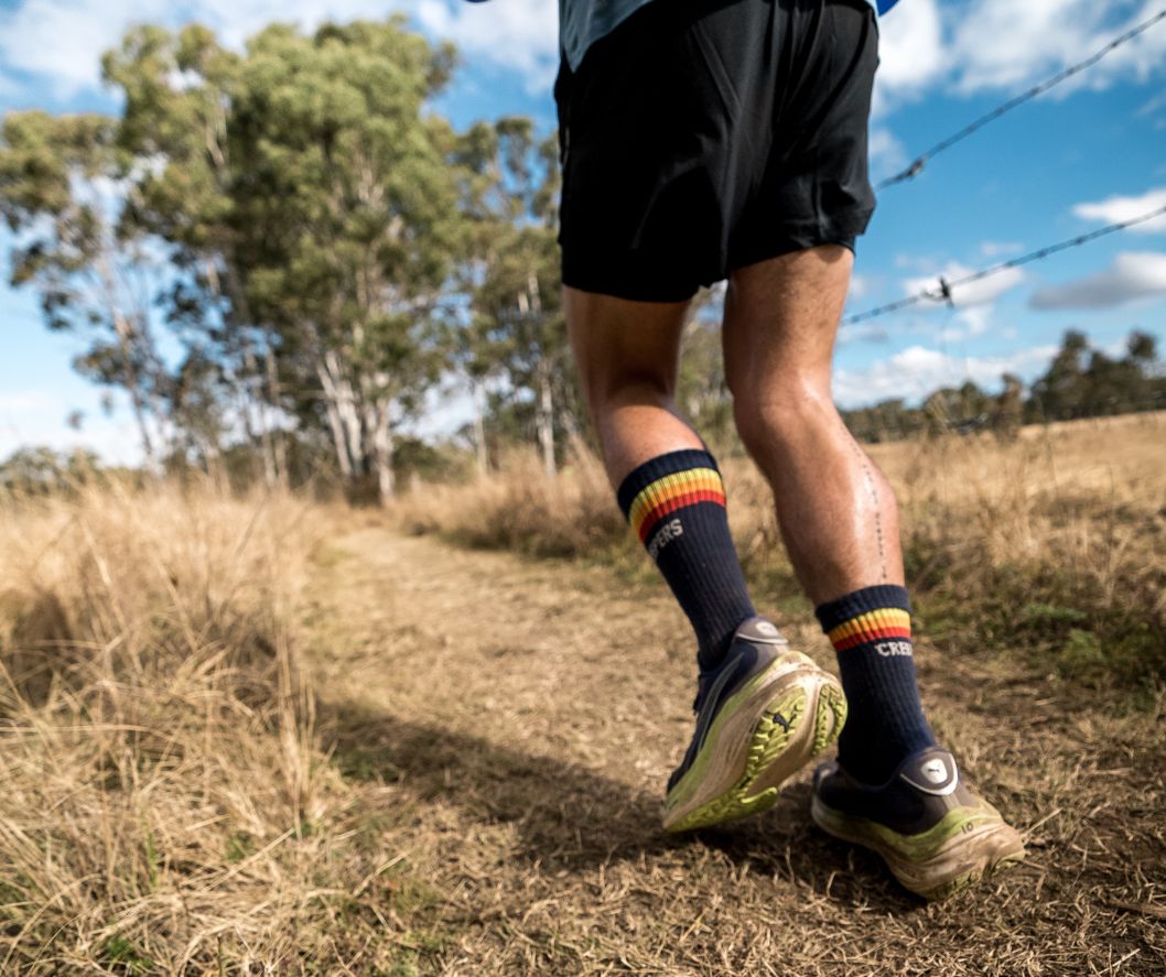 Sam harvey running a backyard ultra in merino toe socks
