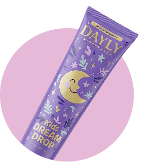 A purple tube of DAYLY Kids Dream Drop with a cute illustration of a smiling moon and stars.
