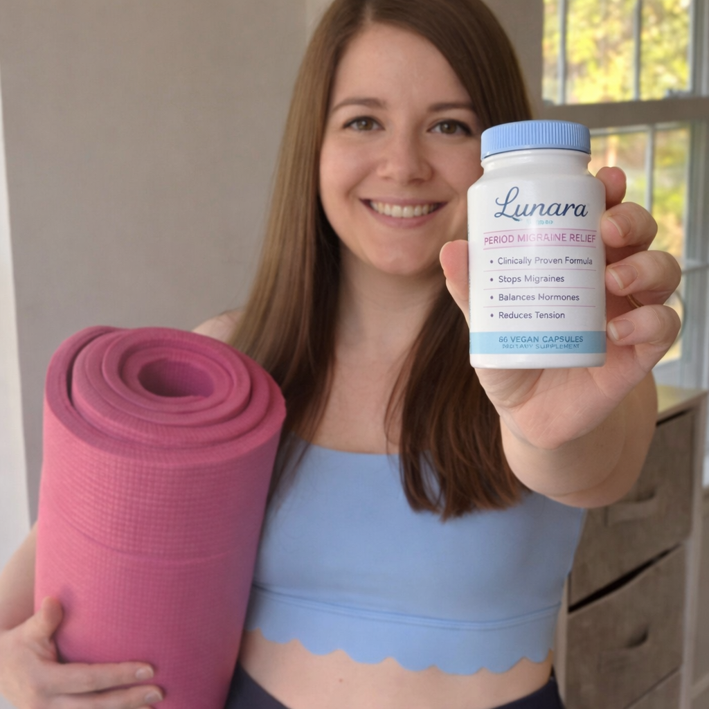 A smiling woman holds a rolled-up pink yoga mat and a bottle of Lunara period migraine relief capsules.