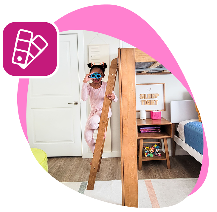 little girl holding onto bunk bed ladder looking through binoculars.