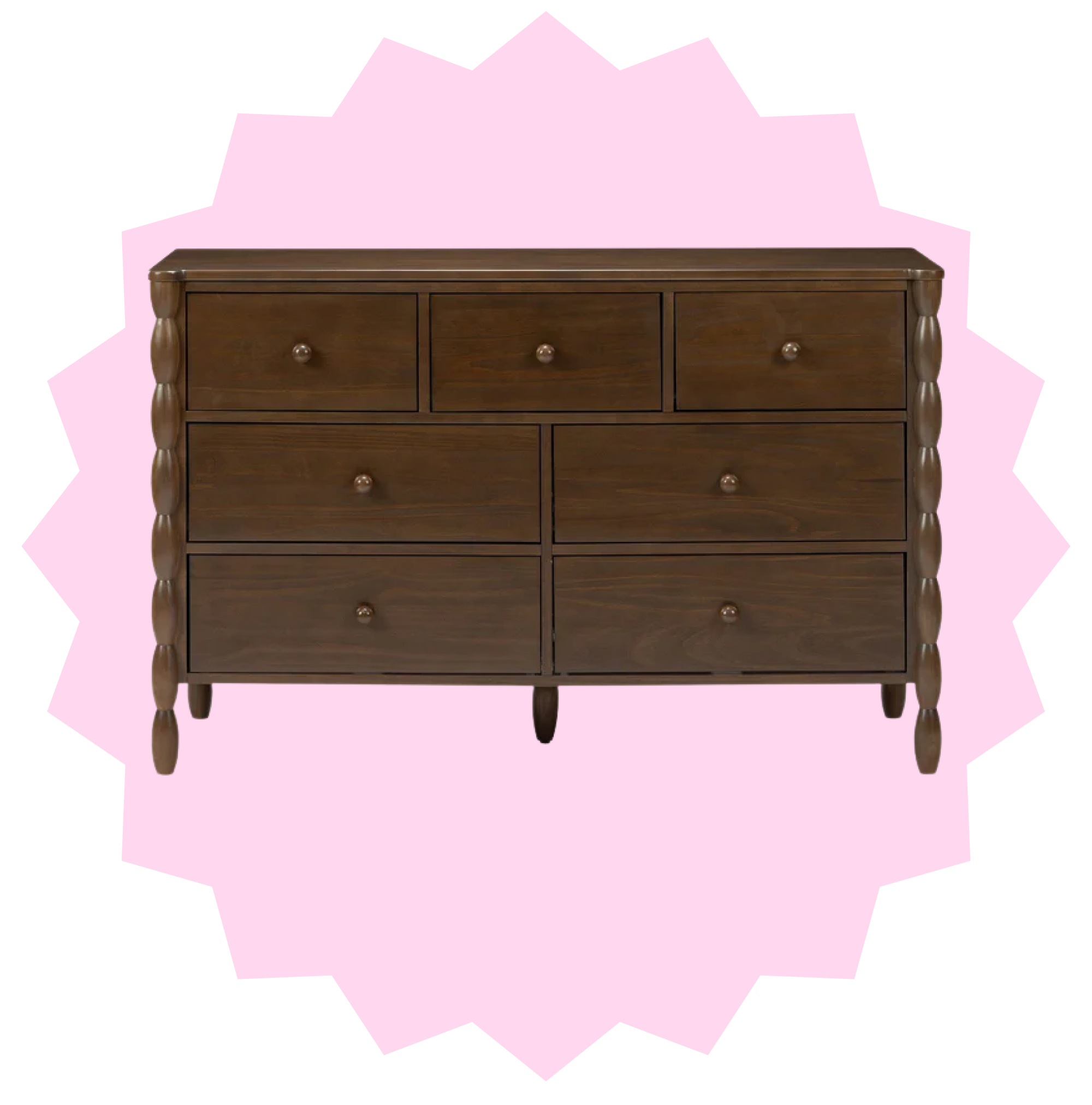 Warm wood dresser on a pink starburst background.