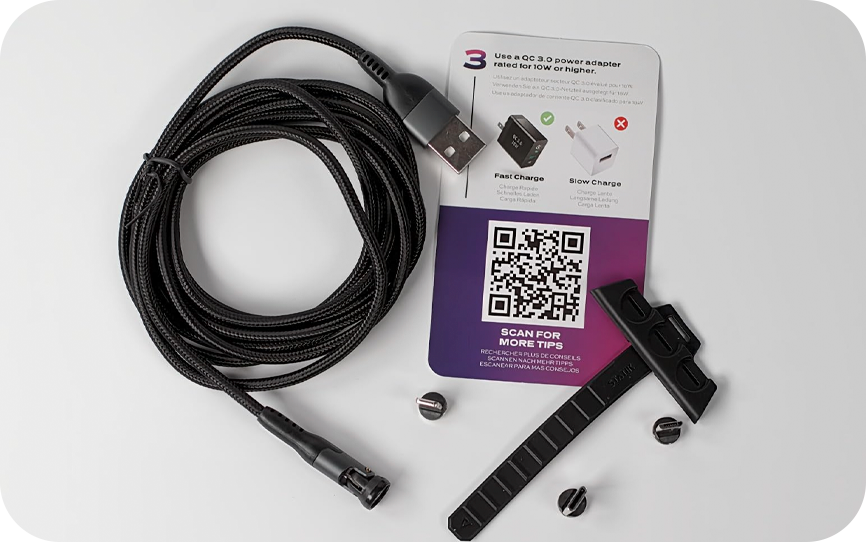 USB cable, QR code card, and small accessories on a white background.