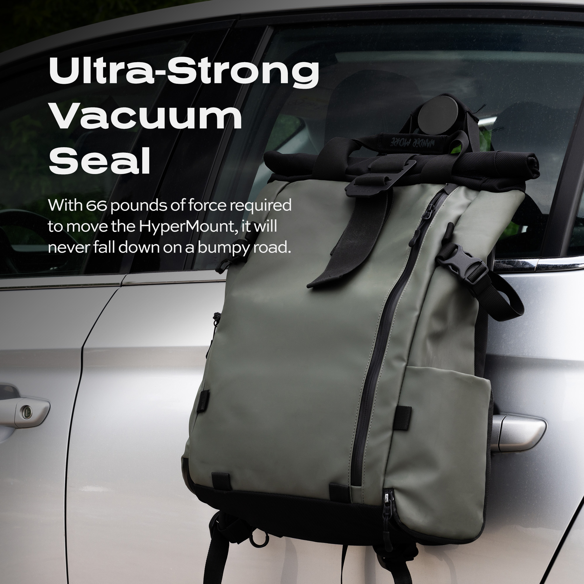 Backpack attached to car door with text about vacuum seal strength.