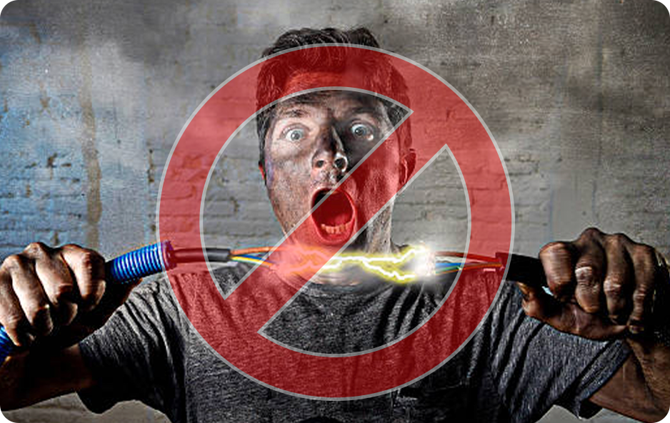 Person holding sparking wires with a red prohibition symbol overlay.