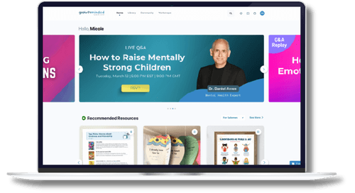 A laptop displaying a website with a banner for a live Q&A on raising mentally strong children.