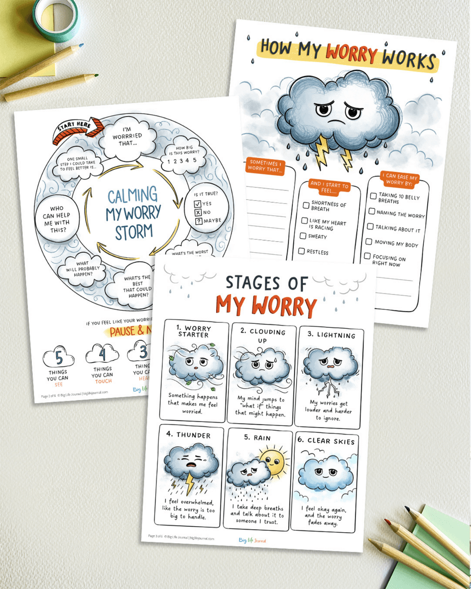 Three illustrated printable worksheets about understanding and managing worry, laid out on a table with art supplies.