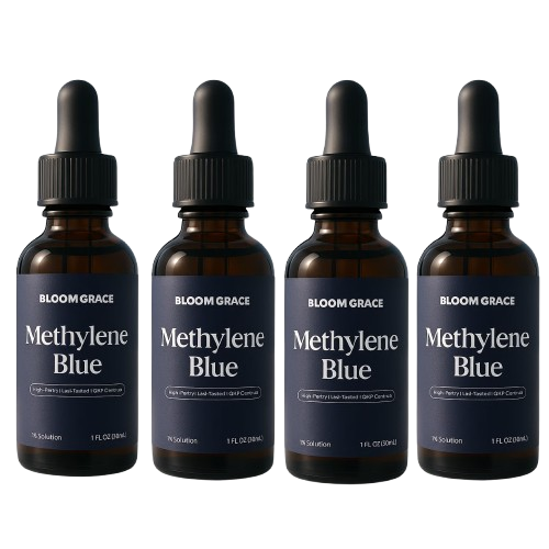 Four brown dropper bottles labeled 'Methylene Blue' by Bloom Grace.