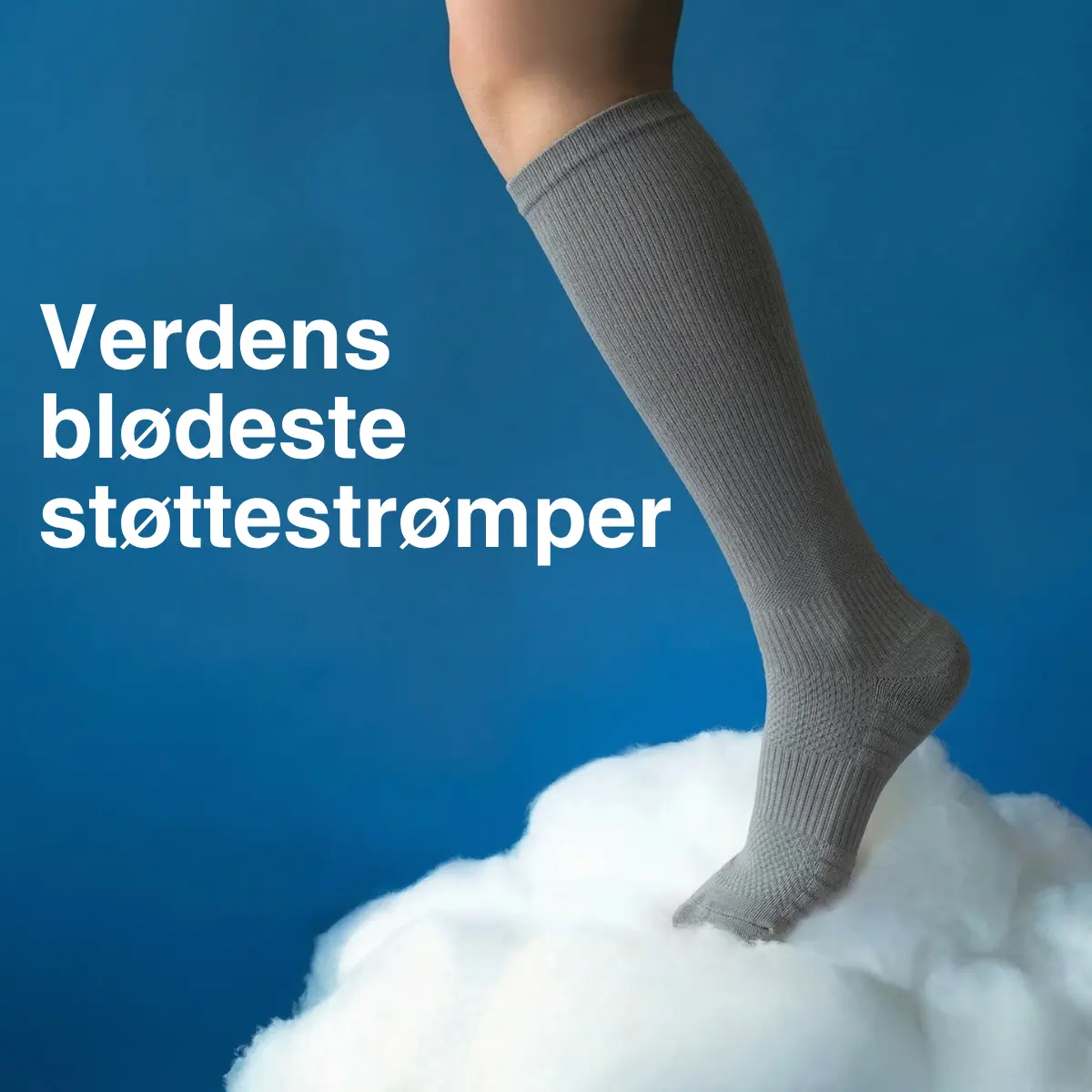 A leg wearing a grey knee-high sock steps onto a fluffy white cloud against a blue background.