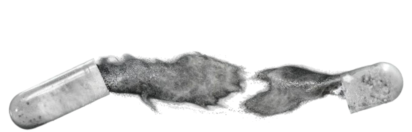 A black and white image of a transparent capsule broken in the middle with powder spilling out.