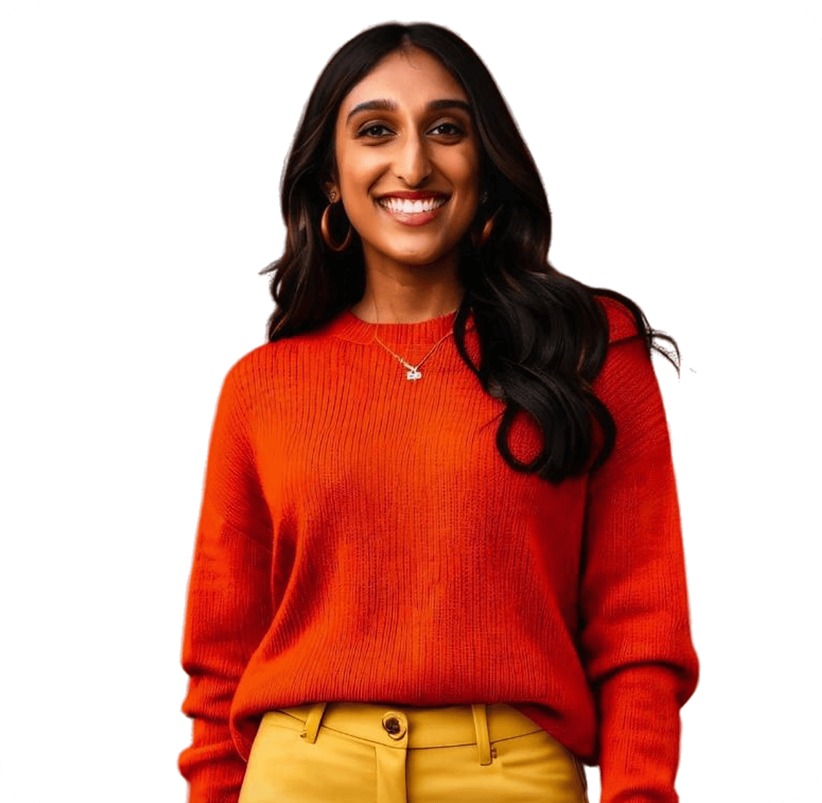 Smiling person wearing an orange sweater and yellow pants against a white background.