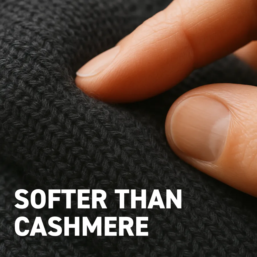 Fingers touching soft black fabric, text reads 'Softer than Cashmere.'