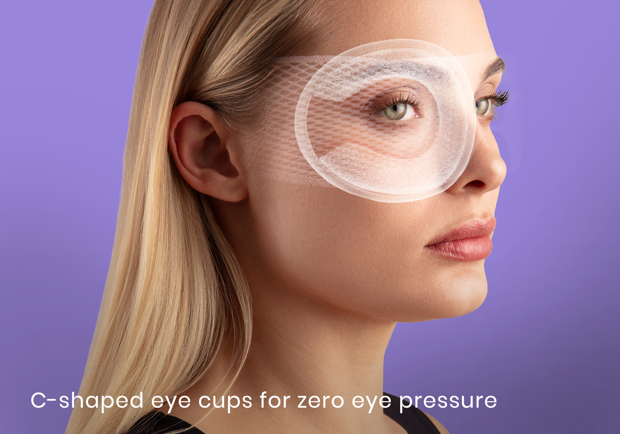 Woman wearing C-shaped eye cups on a purple background.