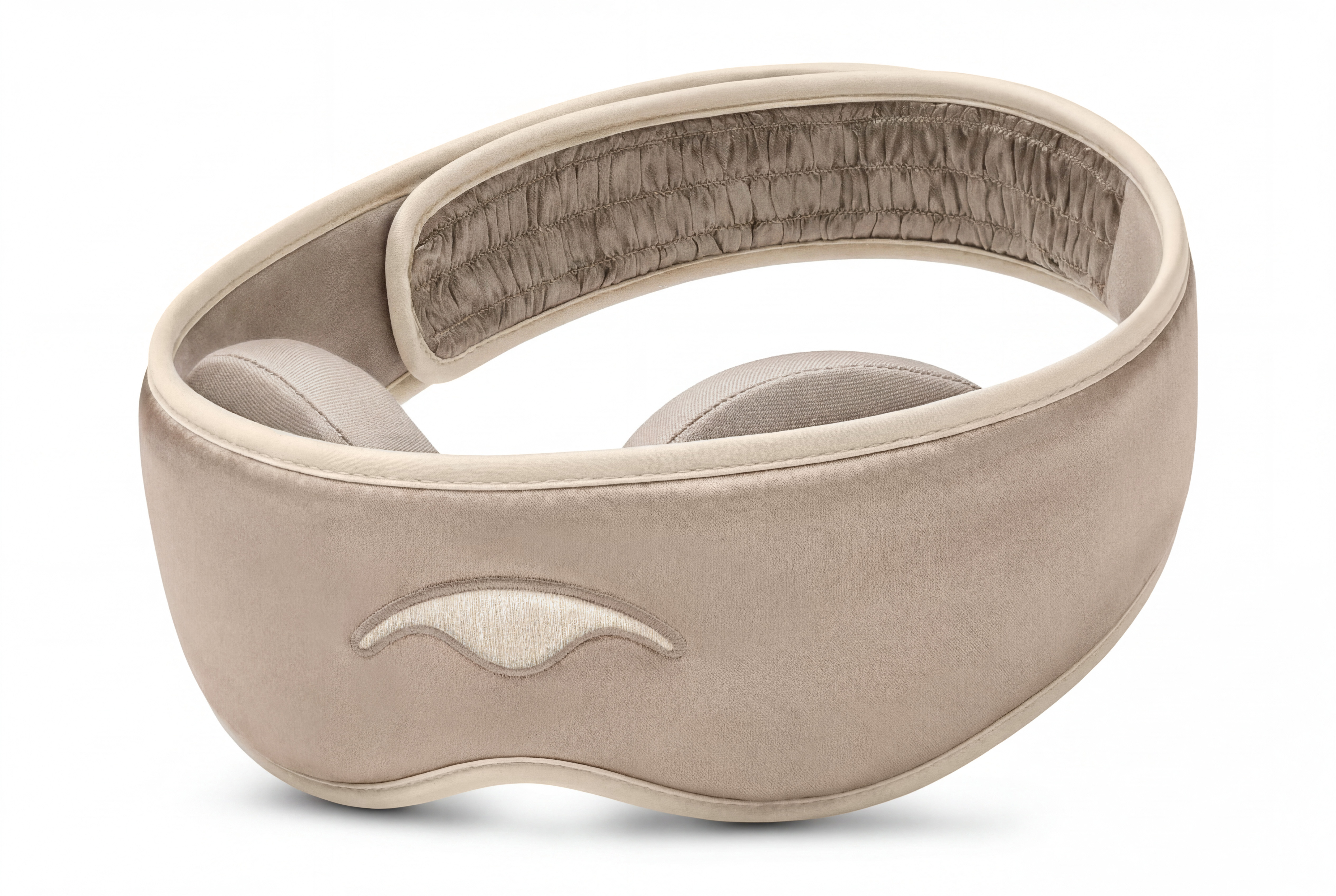Close up product shot with front view of a cream-colored silk Manta Sleep mask