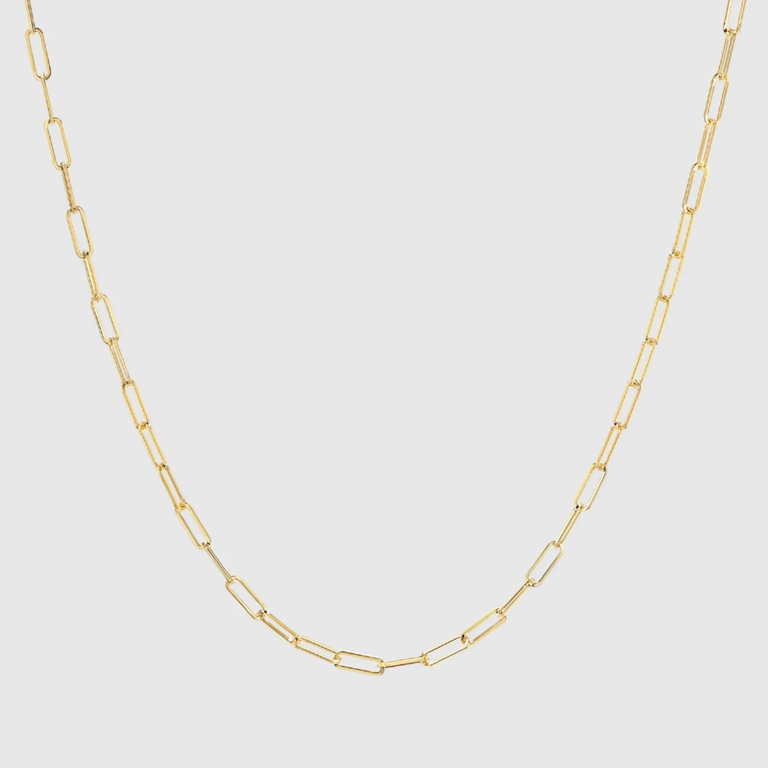 Gold chain necklace with rectangular links on a white background.