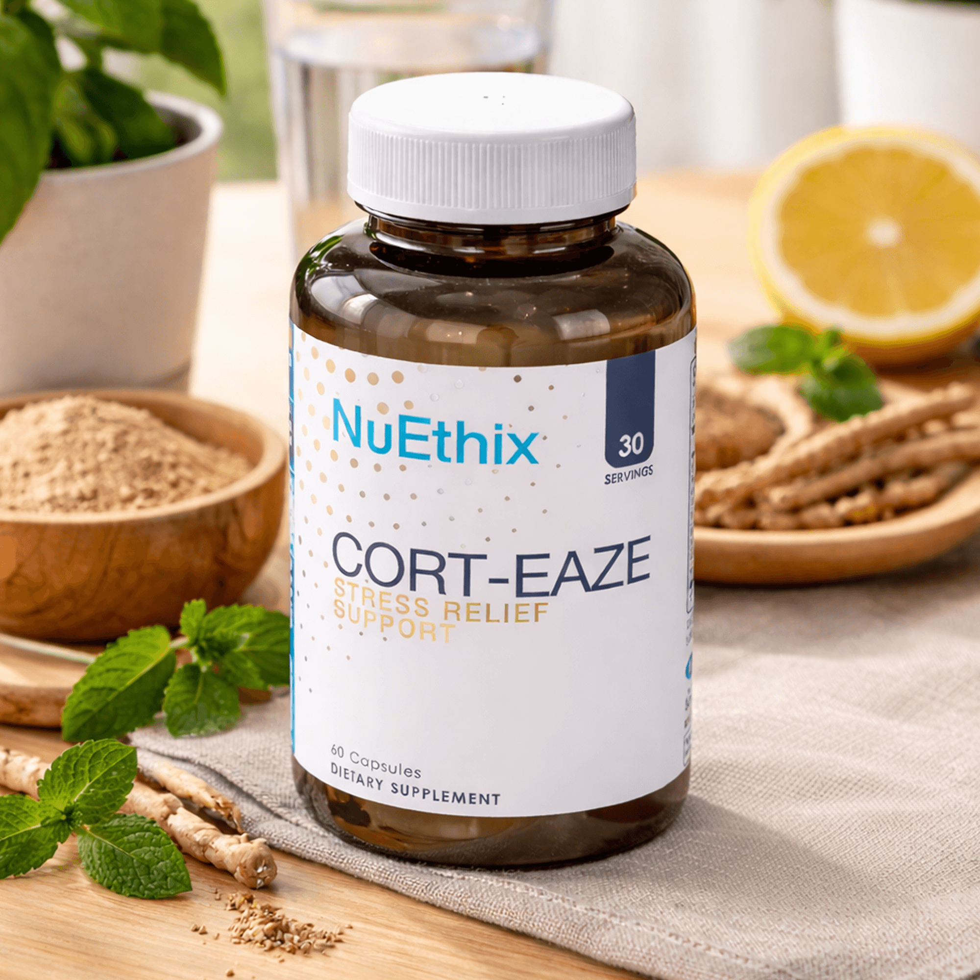 A bottle of NuEthix Cort-Eaze supplements on a table surrounded by fresh mint, roots, and a lemon.