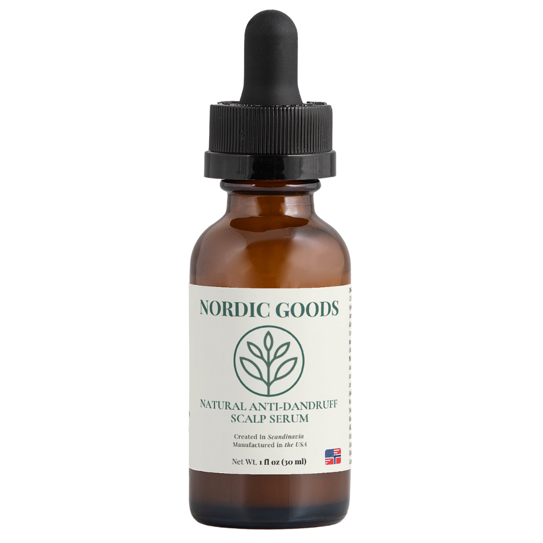 Brown bottle with dropper labeled Nordic Goods Natural Anti-Dandruff Scalp Serum.