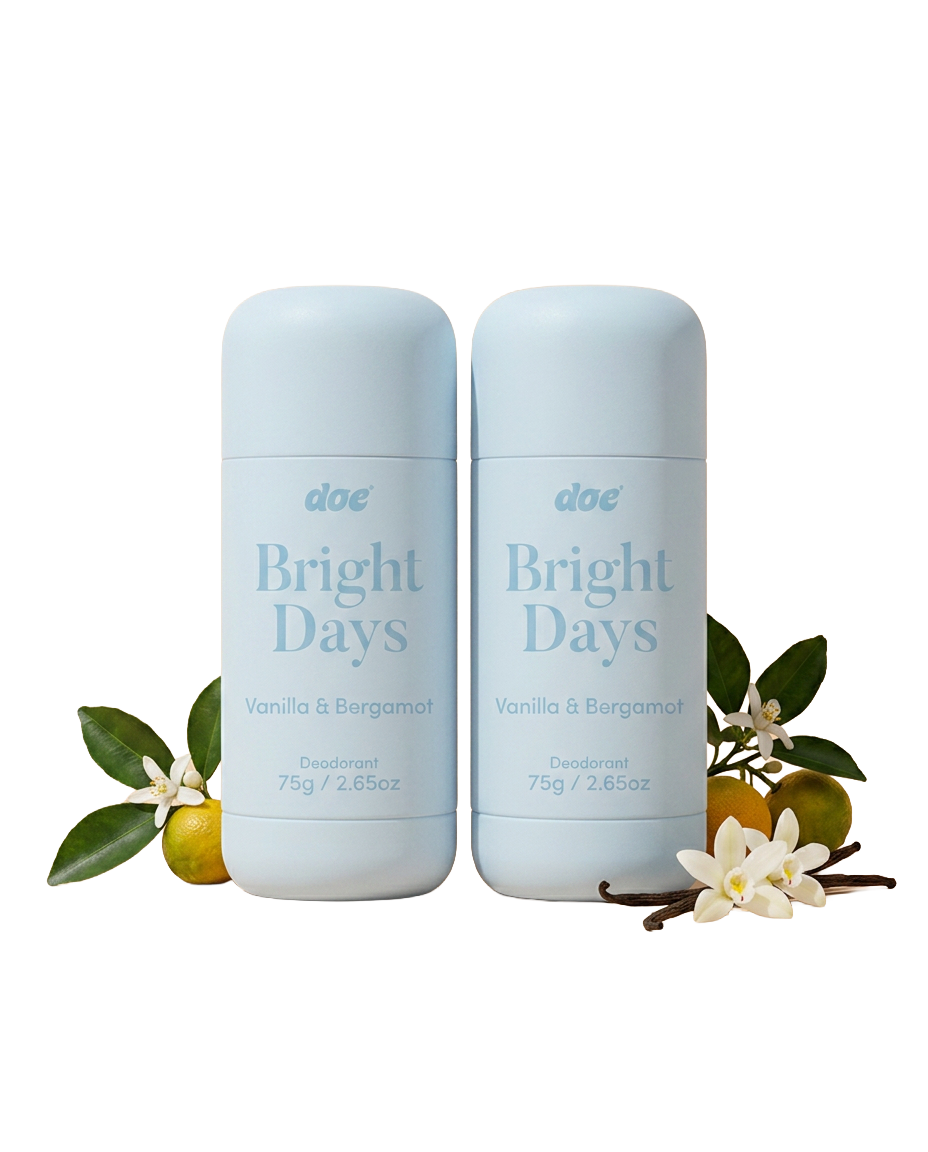 Two light blue sticks of Doe's Bright Days deodorant with vanilla and bergamot fruits and flowers.