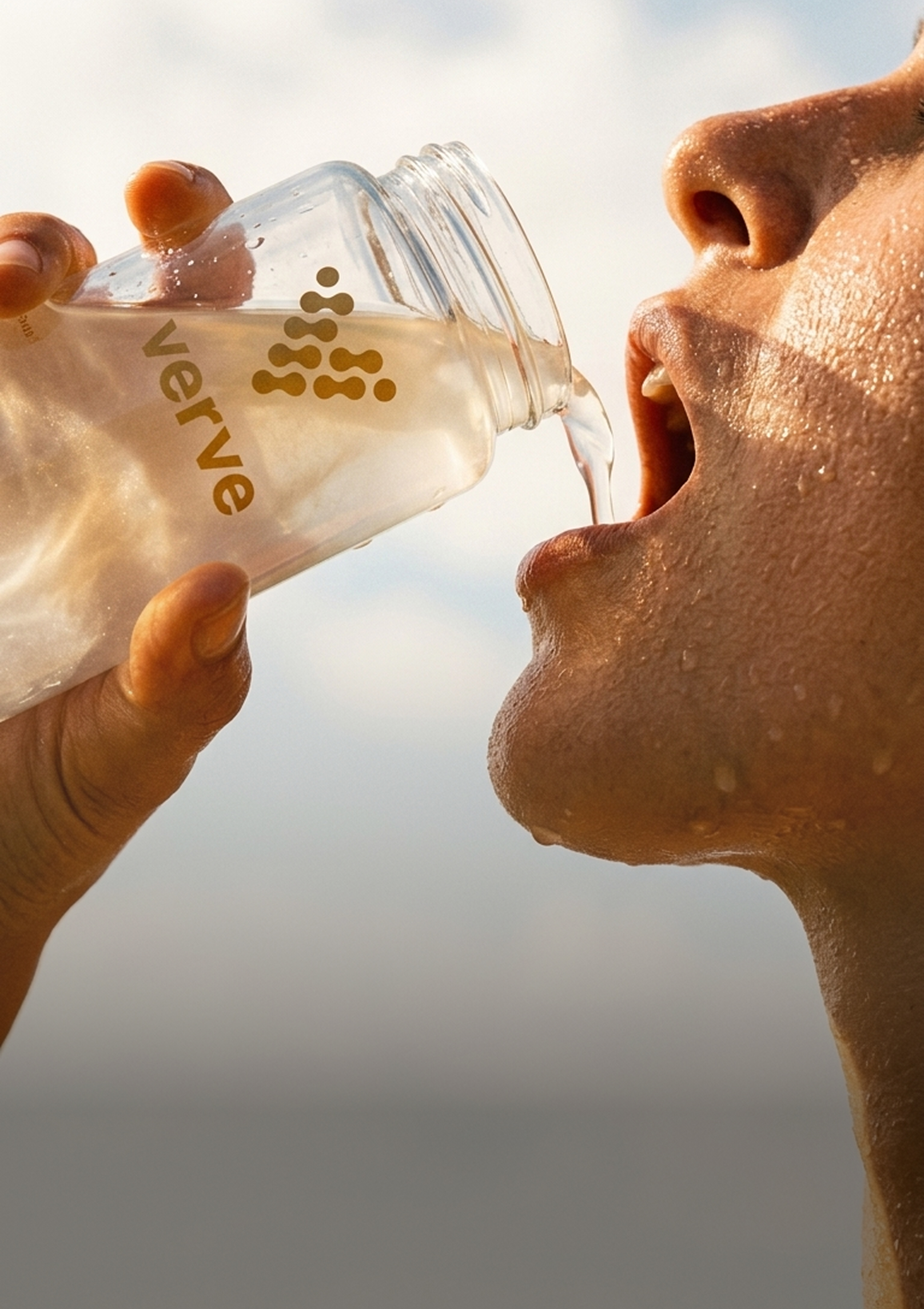 A close-up of a person with sweaty skin drinking from a glass bottle labeled 'verve'.