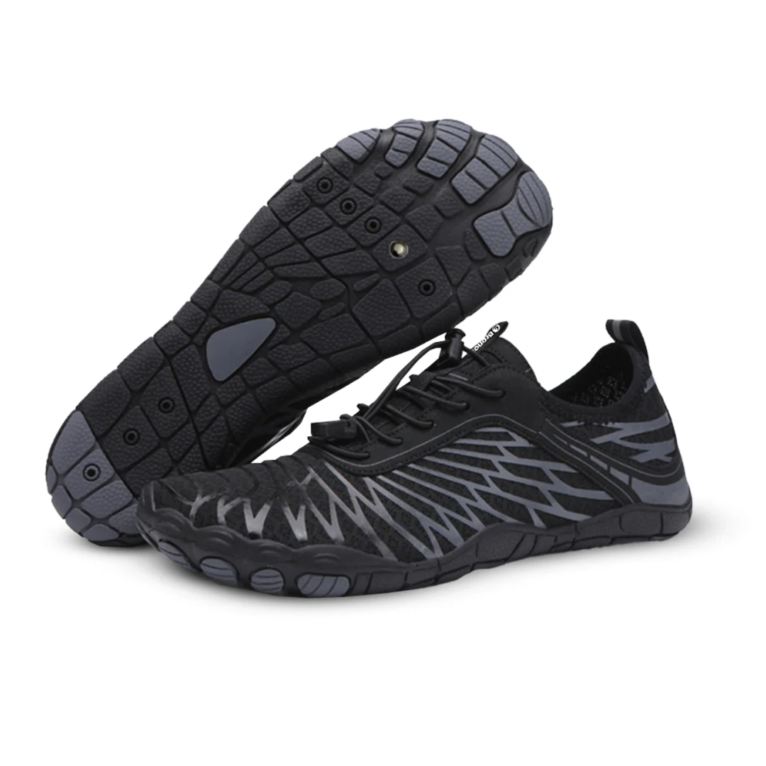 Black and gray athletic shoes with a unique sole pattern.