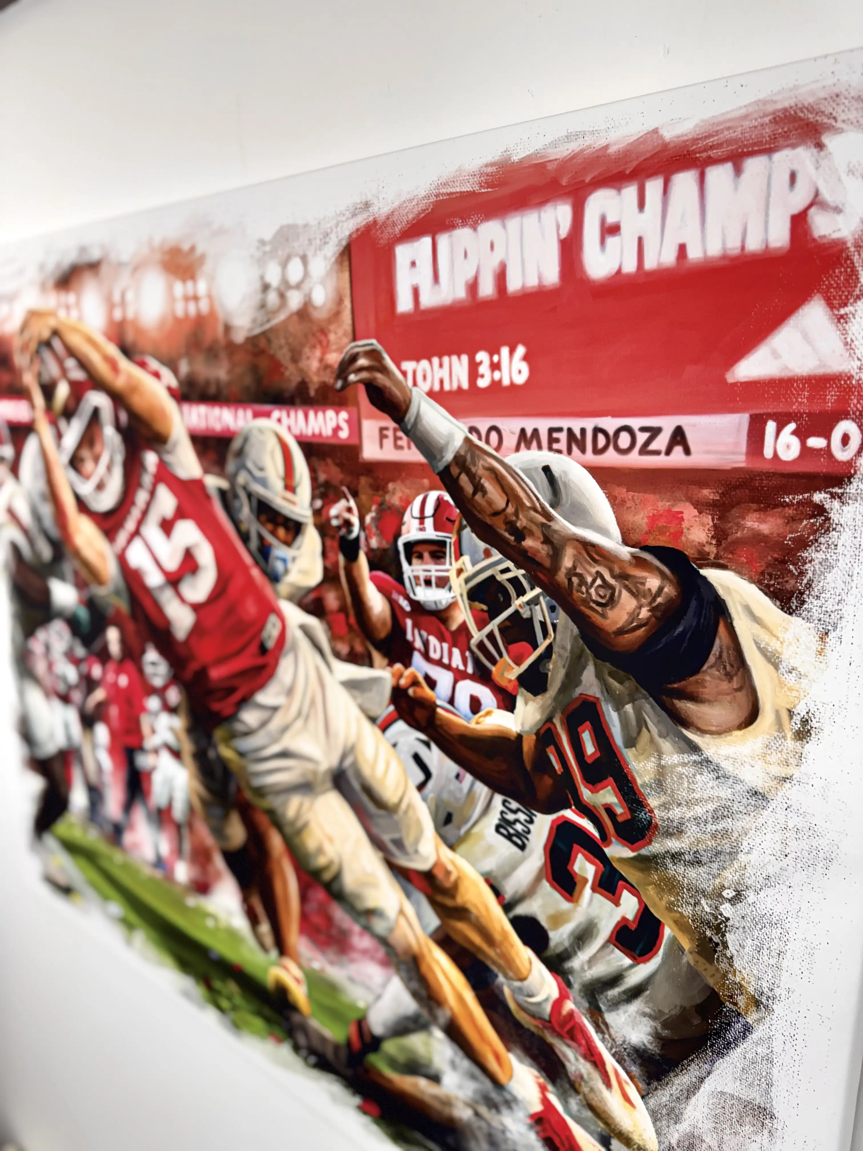 An action painting of a football game, with one player lunging to catch the ball.