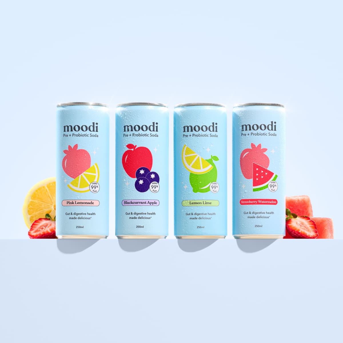 Four cans of Moodi probiotic soda with fruit designs.