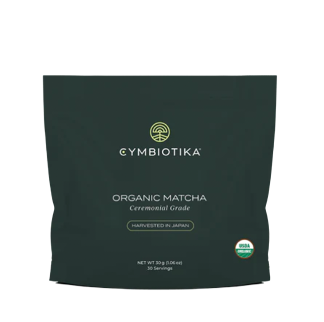 Black package of Cymbiotika organic matcha, ceremonial grade, with USDA organic label.