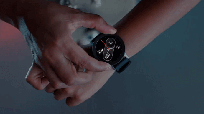 Person adjusting a smartwatch on their wrist.