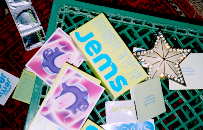 Various colorful cards and packages on a green surface with a decorative star.