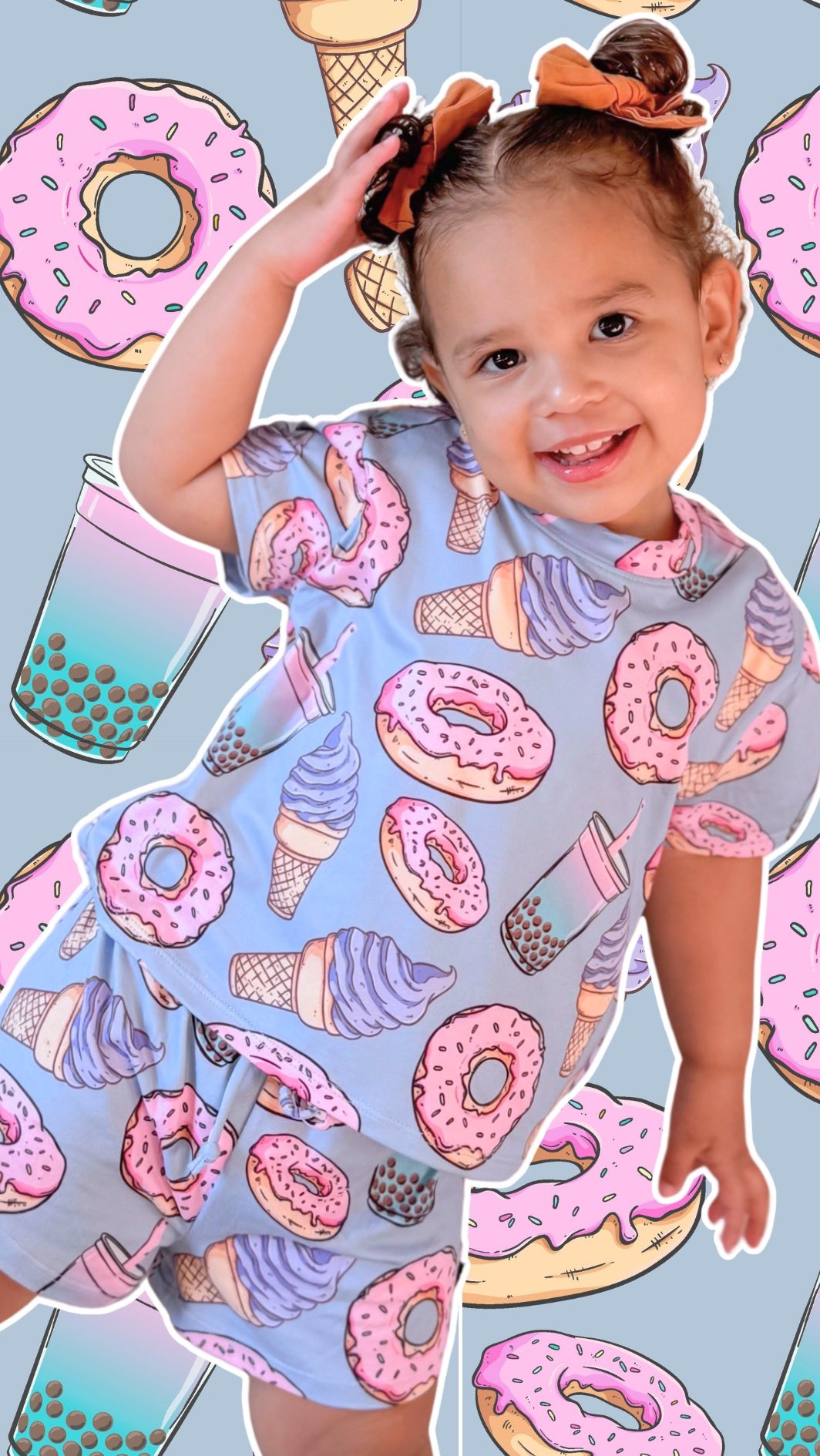 Child in donut-patterned outfit with a playful background of donuts and ice cream.