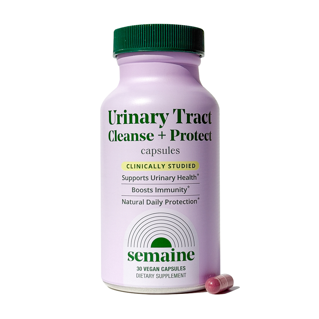A bottle of Semaine Urinary Tract Cleanse + Protect capsules with one capsule next to it.