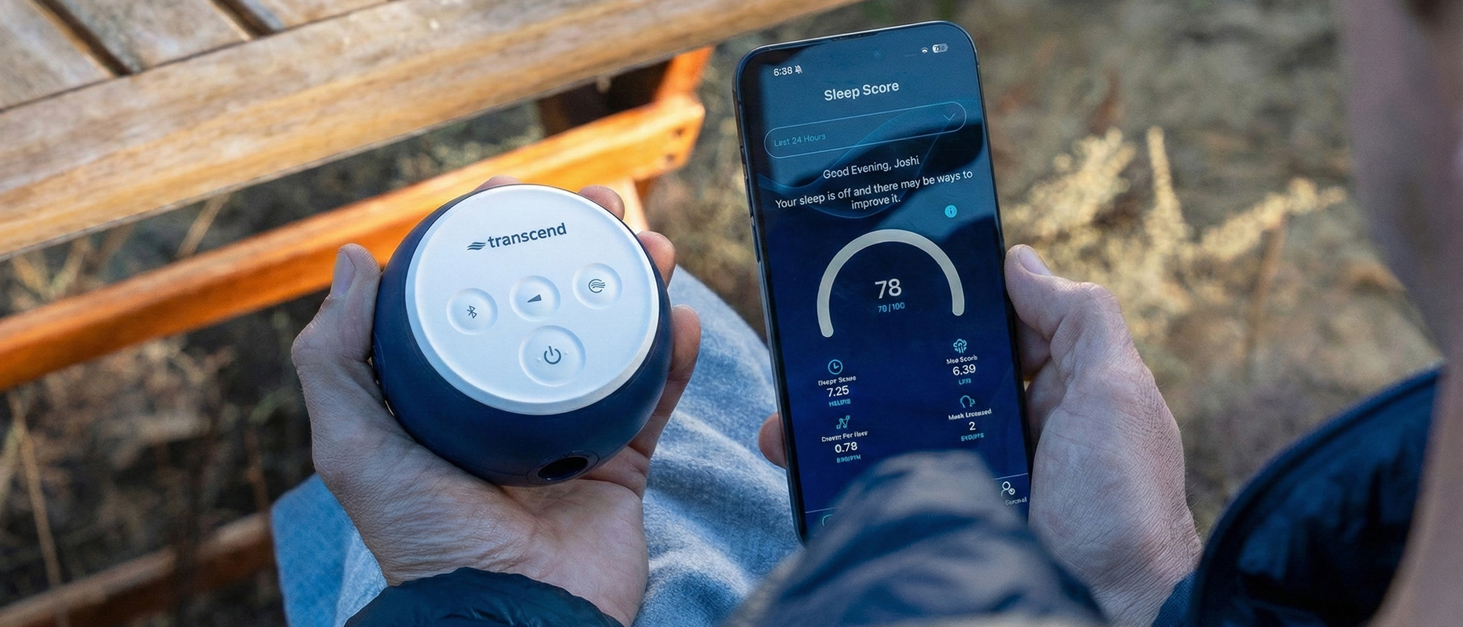 A person holds a round Transcend device and a smartphone displaying a sleep score tracking app.