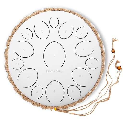 White steel tongue drum with numbered sections and decorative rope edge.