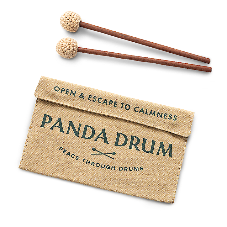 Two drumsticks and a Panda Drum pouch with text.