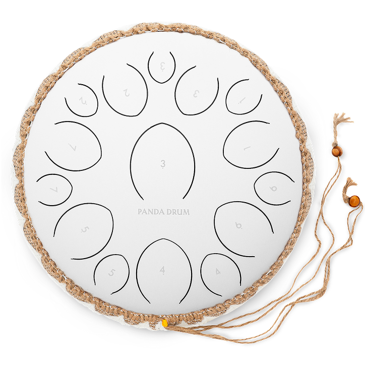 White steel tongue drum with numbered sections and decorative rope border.