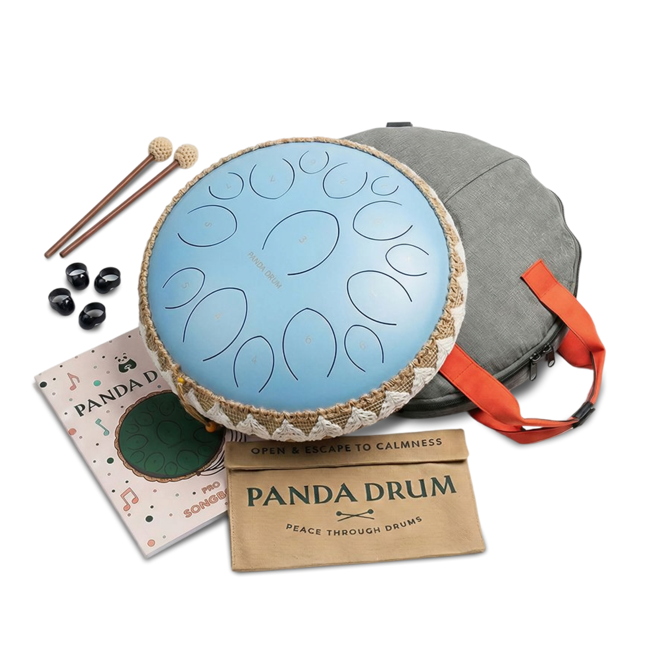 A light blue steel tongue drum kit with mallets, a carrying case, a songbook, and accessories.