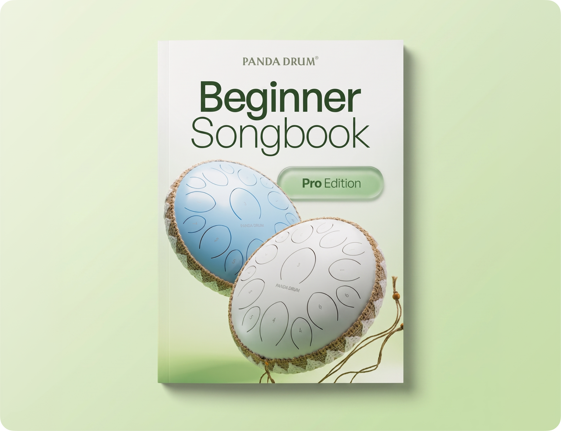 The cover of the Panda Drum Beginner Songbook, Pro Edition, featuring two steel tongue drums.