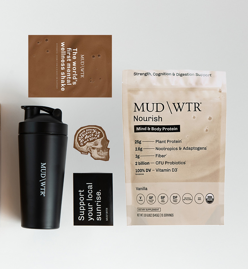 MUD/WTR products including a shaker, packets, and promotional materials on a white background.